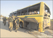 Anti tank missile from Gaza hits yellow school bus Photo: Miri Tsachi/Israel Sun