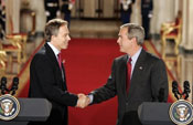 President George W. Bush and British PM Tony Blair in November 2004 at a White House press conference. Photo by: Paul Morse (White House)