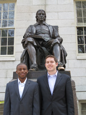 Standing beneath the statue of John Harvard, graduating Harvard Law School students Alexander Chester (r) and Darrell Bennett (l) made the case for the University's divestiture from Iran in the December 11, 2009 The Harvard Crimson. They then lobbied the 37 Harvard alumni who are members of Congress last February for their support.
