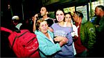 Terrified residents of Sderot running for shelter during a Hamas rocket attack from Gaza. Photo: Eliyahu Ben-Yigal/Jinipix for Israel Sun