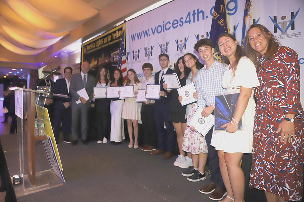 Awardees from Names, Not Numbers and Essay Contest with Glen Landow and Assemblyman Steve Stern on left and and Jane Pashman, Director of Names, Not Numbers at the Suffolk Y JCC.