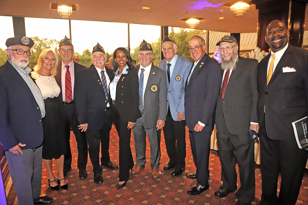 The Color Guard from the Jewish War Veterans with Commander of Post 652 Gary Glick center (Voices Board Member), Mazi Pilip and Rabbi Jay Rosenbaum, who gave the Invocation (second from right).