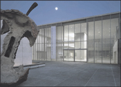 Nighttime view of the Israel Museum�s new Gallery Entrance Pavilion from the north with Claes Oldenburg and Coosje van Bruggen�s Apple Core, 1992 in the foreground. Photo: Timothy Hursley. Image courtesy of the Israel Museum, Jerusalem