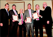 (from left) Anthony E. Mann, Ira Schuman, David S. Kleger, Brad Karp, Jamie B.W. Stecher, Paul Levine. Photo: Michael Priest.