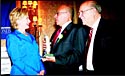Sen. Hillary Rodham Clinton (left) and Joshua Matza (right) present the National Labor Award to Stuart Appelbaum. Photos: David Karp