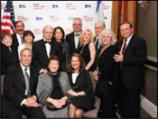 Top: Mrs. Irwin Hochberg; Dr. Joe Frager; Susan Rosenbluth; Morton A.  Klein; Rita Klein; Glenn Beck; (Unknown Woman);  Martin Gross; Mrs. Elie Hertz. Front:  Dr. Alan Mazurek; Sylvia Freyer, Associate Chairman of the Board;  Cong. Michele Bachmann.