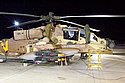 IAF ground crews working on an Apache attack helicopter reading it for another sortie over Gaza. Photo: IDF Spokesman/Israel Sun