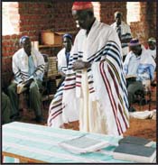 Rabbi prepares for service.