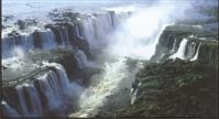 TThe magnificent Iguazu Park and Falls.  An impressive amount of water plunges 220 ft into the abyss below.