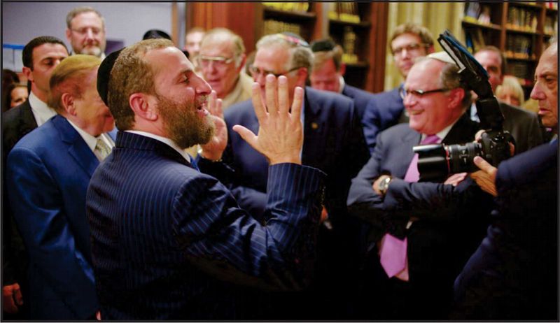 Rabbi Boteach with audience following the panel. Photo: Omar Flores.